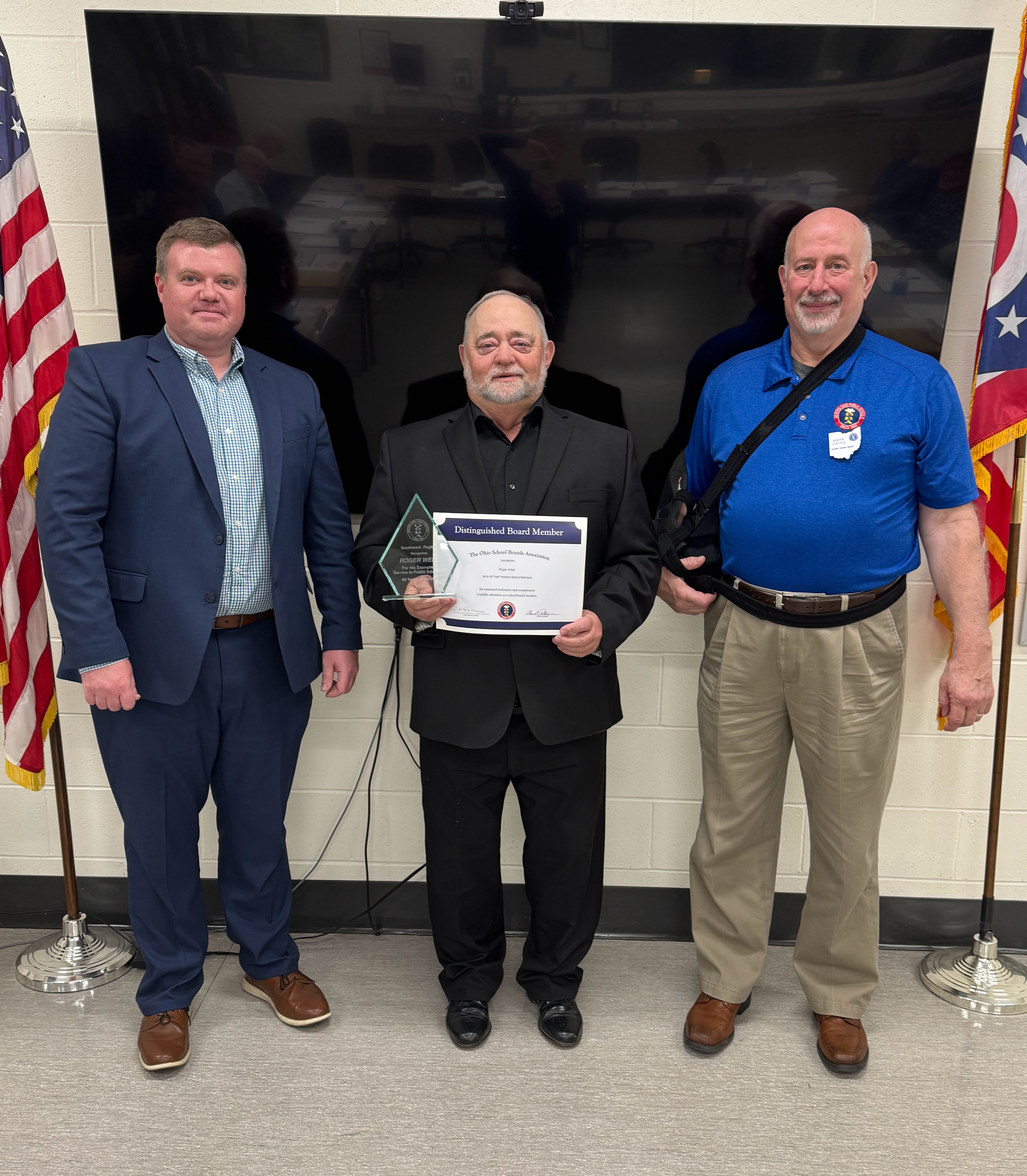 Curt Bradshaw, Roger West, and Mark Ewing at the Southern Ohio ESC Governing Board Meeting on April 22, 2025, where the Ohio School Boards Association recognized Mr. West for 40 years of dedicated school board service.